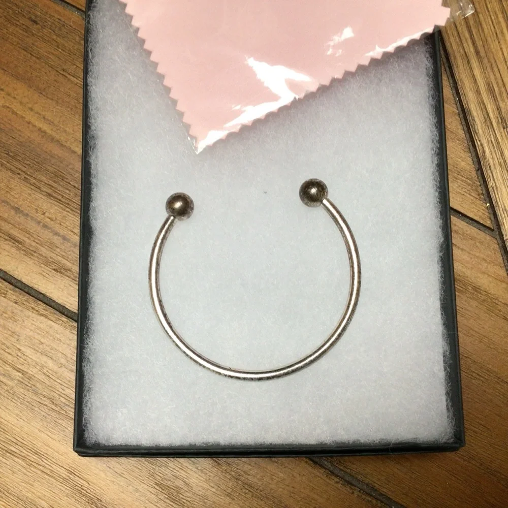 Elegant Sterling Silver Charm Bangle Bracelet - Picture 1 of 6